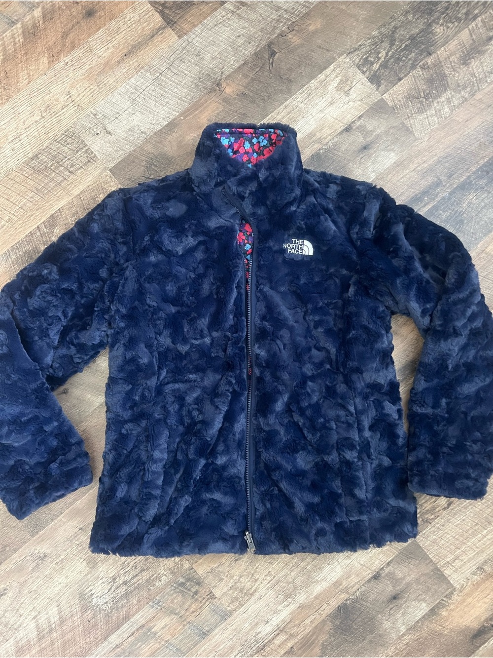 The North Face Kids Reversible Navy Plush Fleece Jacket with Floral Pattern